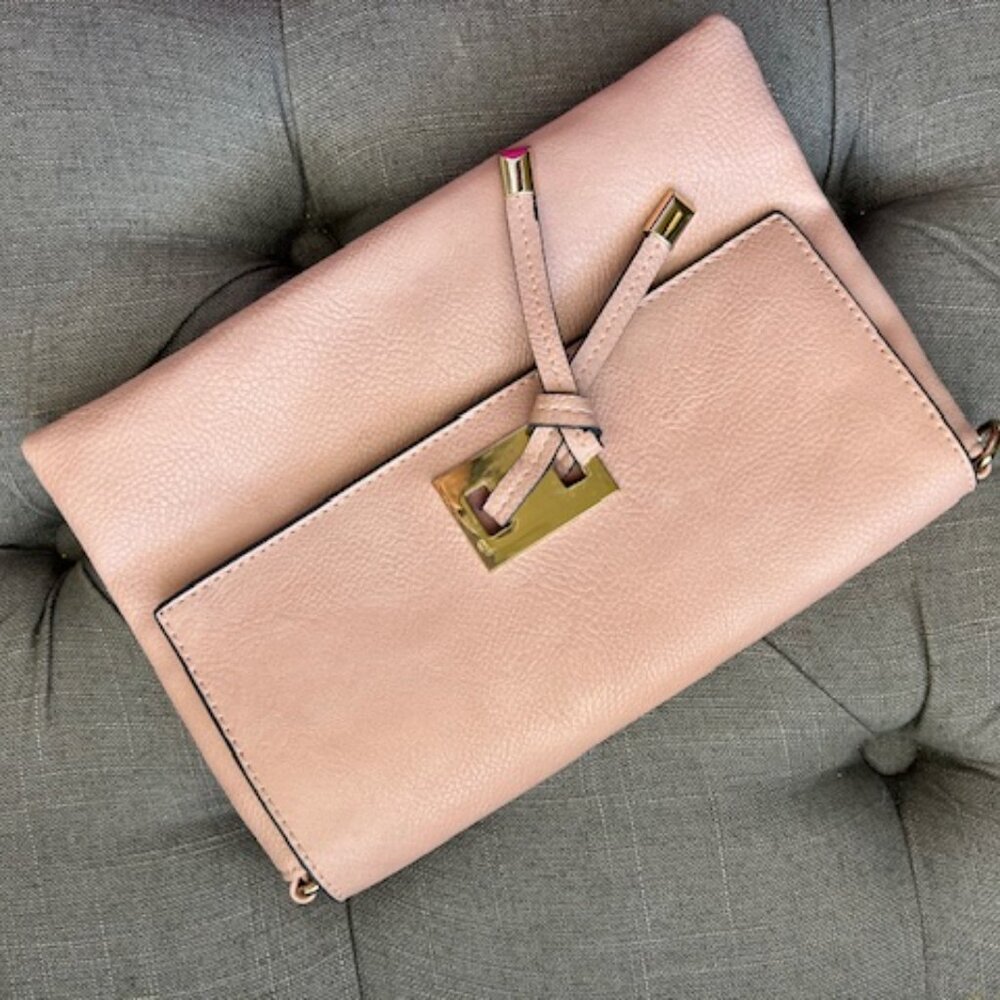 Pink clutch bag
